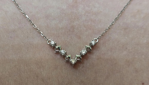 Darry Ring DR Paris V Necklace worn on neck